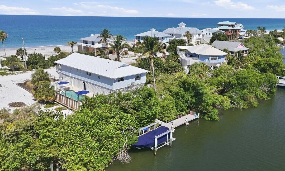 Palm Island House | 4BR Gulf-view pool home on Palm Island, sleeps 10, Boat Dock
