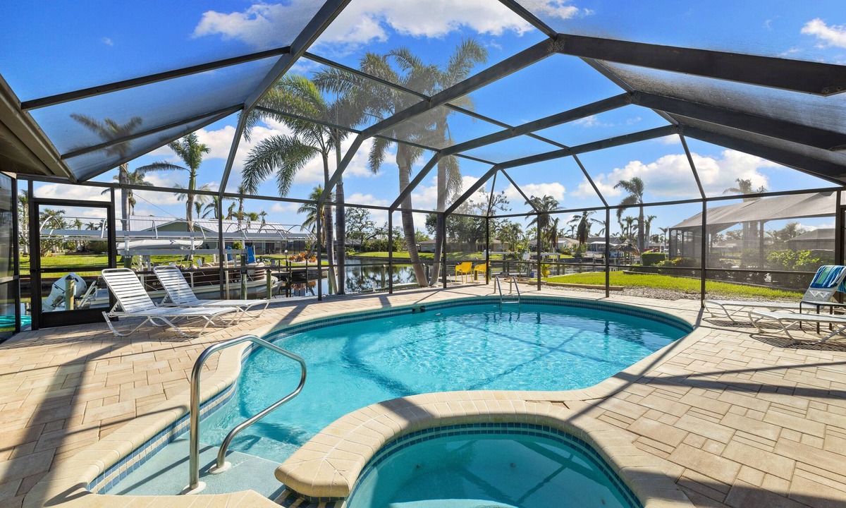 Yacht Club House | 5 Bedroom/4 Bath Saltwater Pool Home! Kayaks and Fishing off the dock! Add Boat!