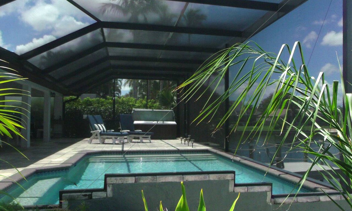 Pelican House | 80-Ft Waterfront Resort-Like Retreat, Relax Heated Pool Jacuzzi Bikes Pier