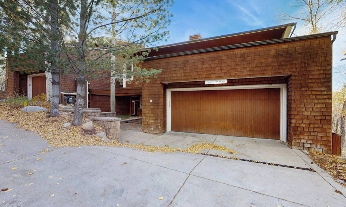 West End House | Elegant Aspen townhouse with an inviting deck, fireplace, and washer/dryer