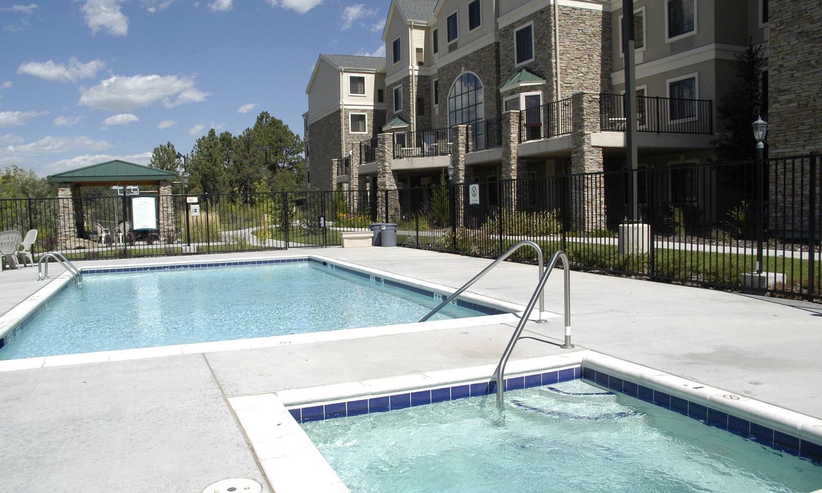 Rockrimmon Condo | Equipped Suite with Mountain View | Outdoor Pool Access, Housekeeping + Business Center