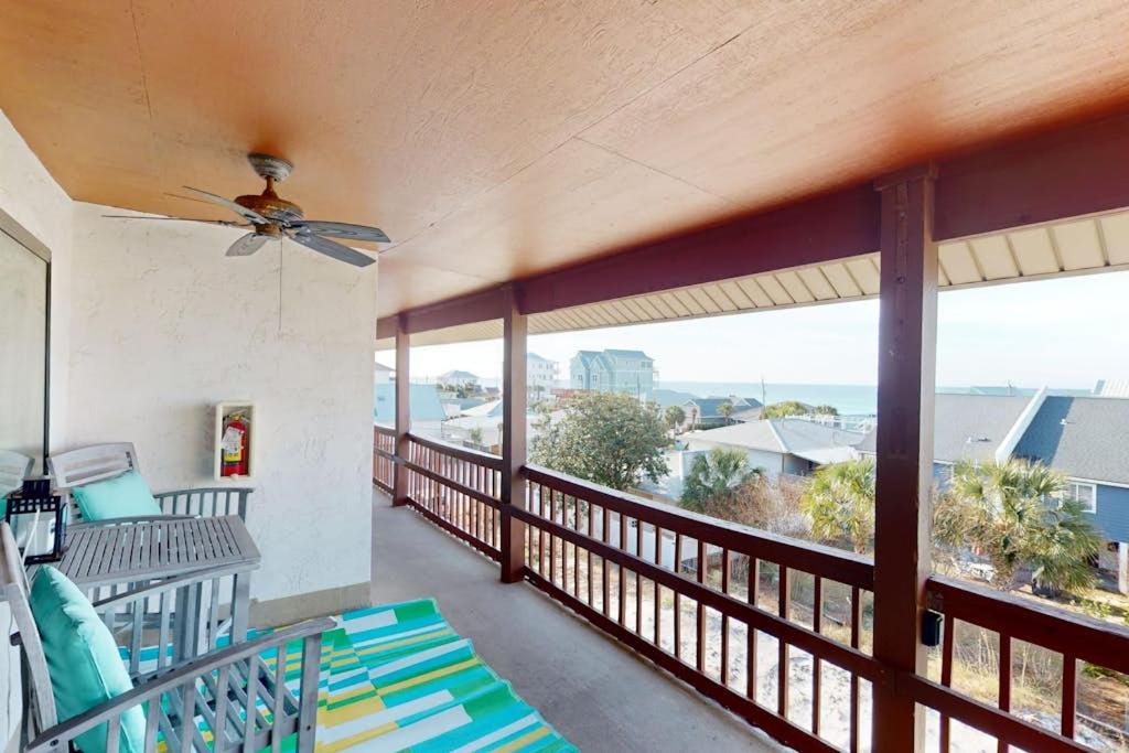 Holiday Beach House | Gulf view 2 story condo near the beach with porch streaming laundry and central AC