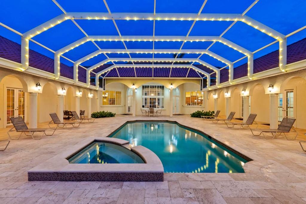 Rural Estates House | Knickerbocker Estate - Exclusive 9 BR Getaway in Naples! Enjoy Private Pool, Outdoor Dining and Expansive Grounds Experience Tranquility with Easy Access to Naples Best!