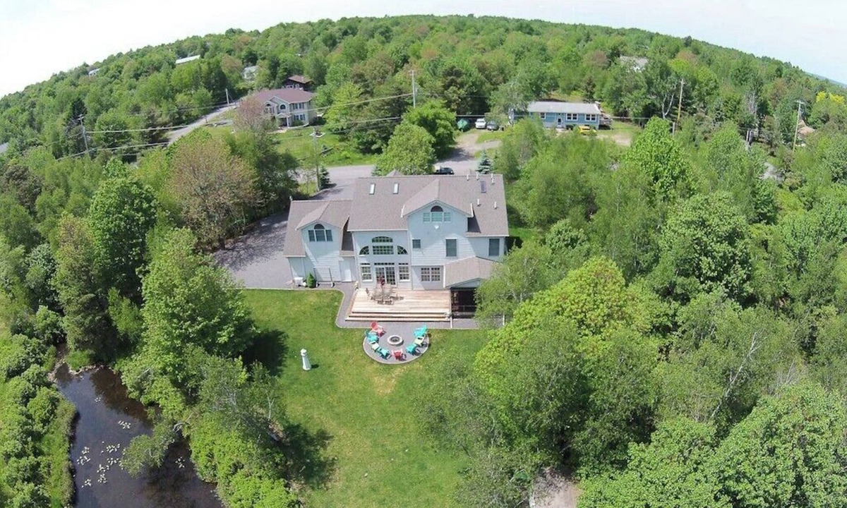Long Pond House | Lakefront Oasis in the Pocono Mountains with Hot Tub + Views