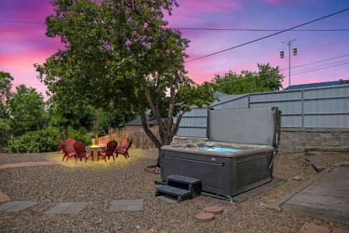 Dupont House | Light-filled home with outdoor hot tub and firepit