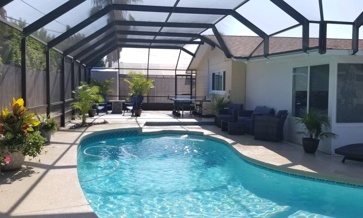 Ormond Shores Estates House | PVT OASIS HTD Pool Home Beach/River/Kayaks/Surf/Bikes/GameRm/Fireplace/Ping Pong