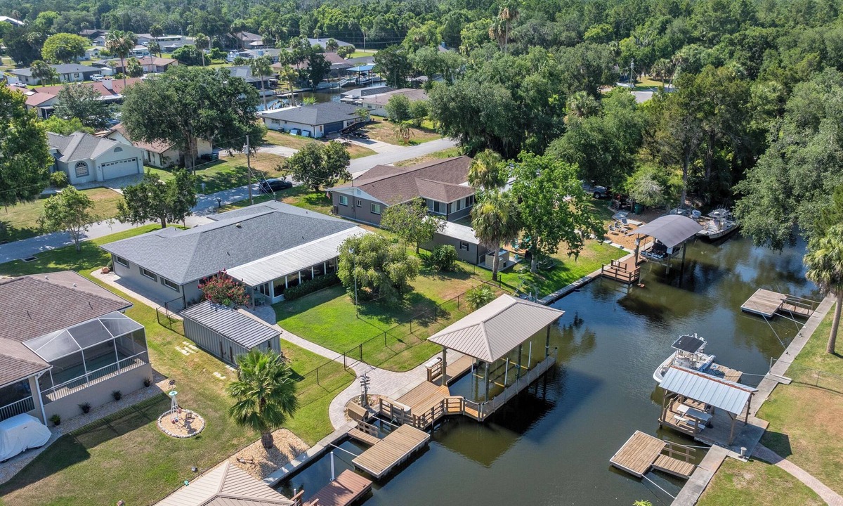 Indian Waters House | Reserve your stay today! Canal-front rental with a boat dock available.