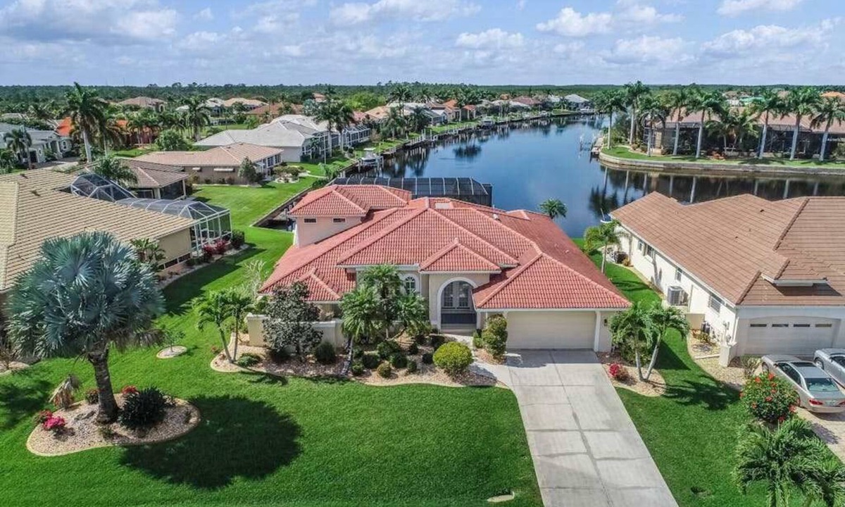 Burnt Store Isles House | Sailboat-Access Waterfront Retreat with Sunset Pool Living