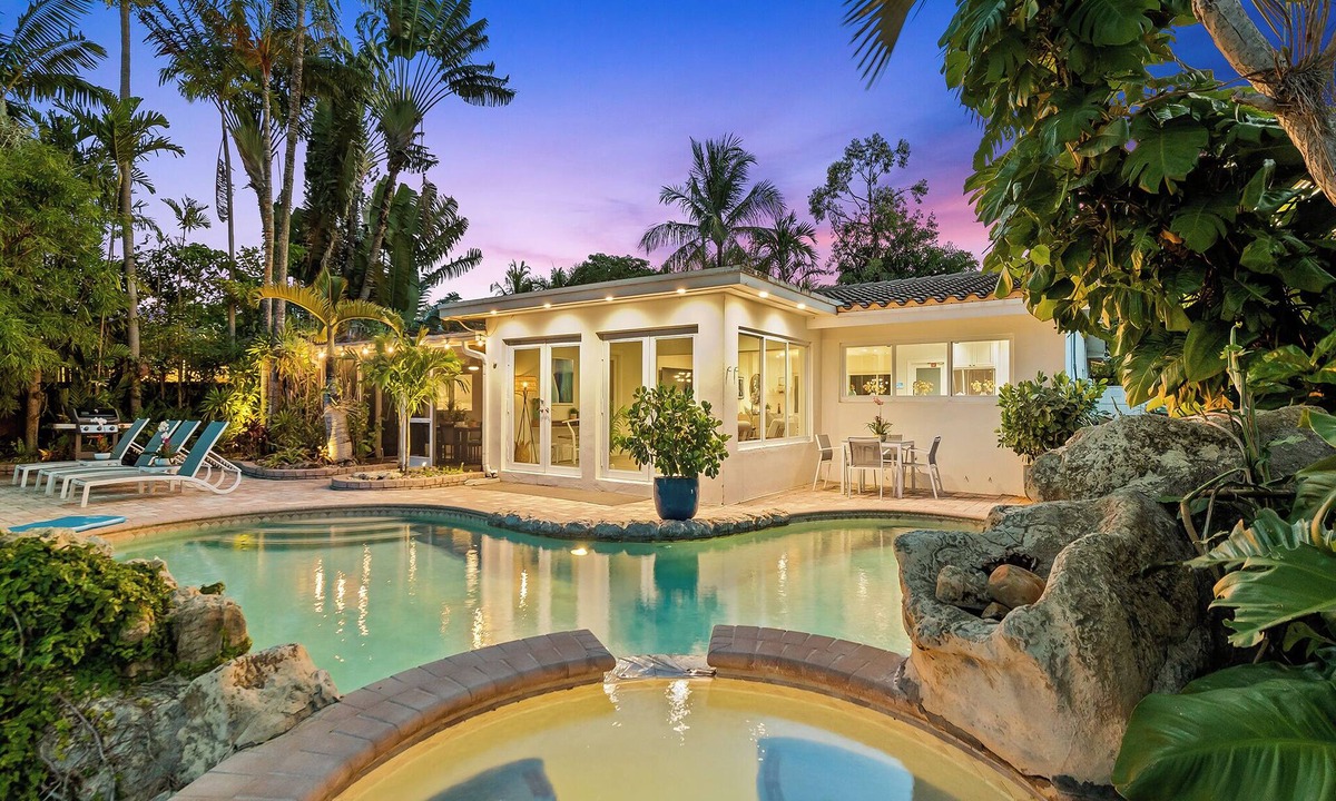 Coral Shores House | Stylish Modern Tropical Waterway Retreat with Private Pool Near Beaches!