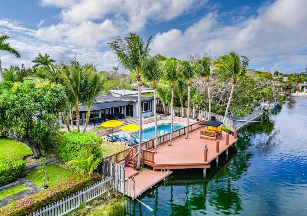 Poinsettia Heights House | Waterfront Heated Pool Home Game & 6 min Beach