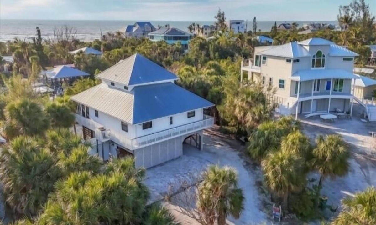Palm Island House | Welcome to your dream island! Escape to the serene charm of Palm Island!