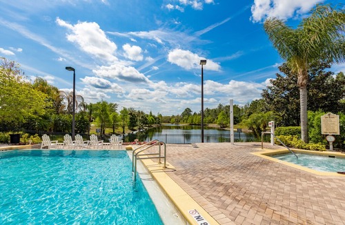 West Kissimmee Condo | 2nd floor condo w/ gym, shared pools, balcony, sauna, hot tub, near theme parks