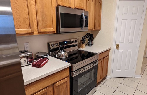 Windsor Hills Condo | 3 BR Condo with Beautiful Pool & Water Park Minutes to Disney Worlds Front Gate