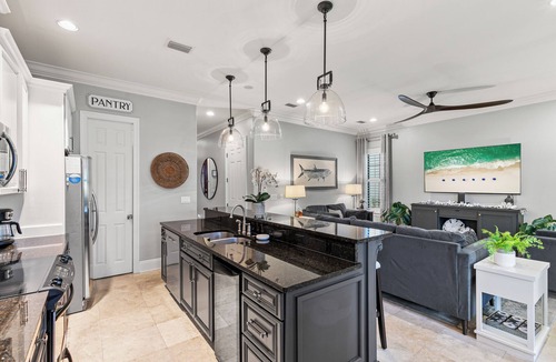 Villa Lago House | 3BR Beach Villa with 2- GOLF CARTS! Steps from Pool! Near Wharf. Beach Tram.
