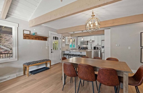 Highland Meadows Ski Chalet | 3BR West Vail riverfront duplex, hot tub, fireplace, yard