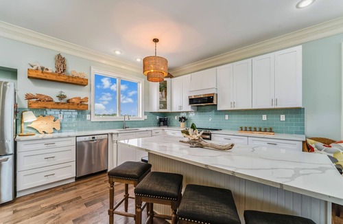 Plantation House | 5 BR 5 Bath BEACH FRONT home in The Plantation - located near community pool with access!