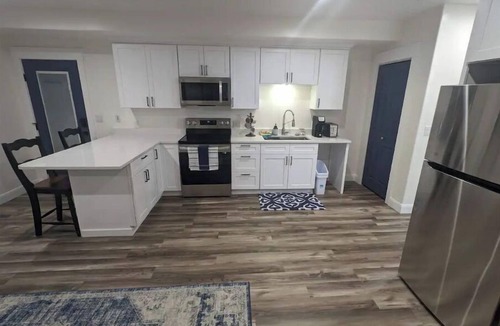 Herriman Apartment | Acadia Studio - Ground-Level Farmhouse w/Shared Hot Tub - 25 Min to SLC