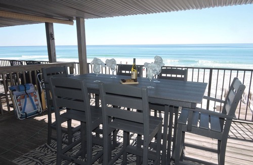 Miramar Beach House | Any Closer to the Beach, You'd Have Sand in Your Sheets! After summer specials.