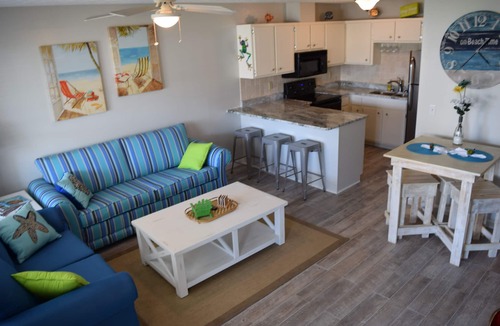 West Panama City Beach Condo | Beach access #73 across the street! Easy Parking! INQUIRE ABOUT SNOWBIRD RATES!