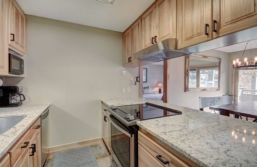 East Village at Copper Condo | Beautiful Ski Chalet with hot tub. 1 Minute to Super Bee Lift! AN203