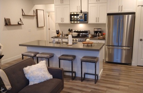 Pinebrook House | Beautiful Townhome Centrally Located Pet Friendly Hot Tub & Bonus Basement Room