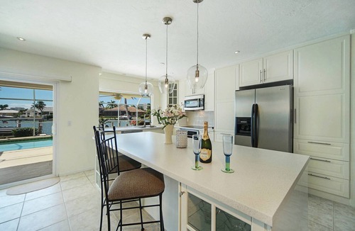 Marco Island House | Beautiful waterfront home with big, private pool close to Tigertail Beach.