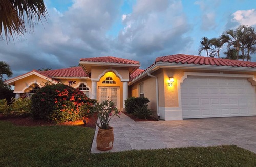 Central Naples House | Boutique Luxury Villa in Naples–Gated Cul-de-Sac Gem with Heated Saltwater Pool