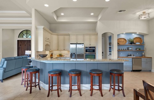 Central Naples House | Briarwood: Home w/two primary suites-saltwater pool/spa & outdoor kitchen & entertaining area w/TV