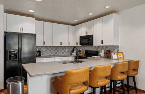 Steamboat Springs Condo | Burgess Creek Bungalow, Heated outdoor pool, hot tub & Private Creekside Patio!