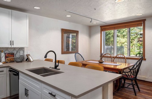 Steamboat Springs Condo | Burgess Creek Bungalow, Heated outdoor pool, hot tub & Private Creekside Patio!