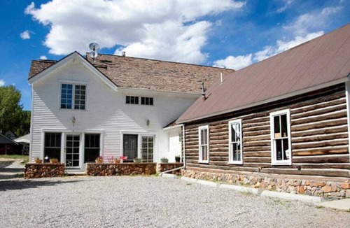 Twin Lakes Cabin | Carriage House at Roadhouse Lodge: romantic suite, fireplace & lake-view deck
