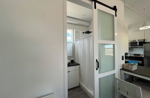Beryl Junction House | Charming Desert Beach House Tiny home, with AC, WiFi, game room/fitness room.