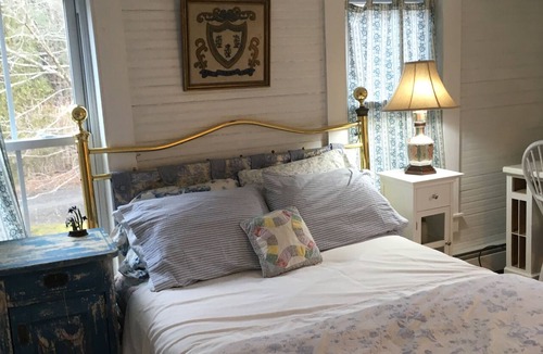 Bantam House | Charming, river front compound