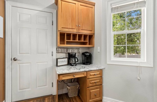 Windsor House | Cozy 4-bedroom home featuring a fun game room, private basement media room, a warm fireplace, and a spacious backyard deck perfect for relaxing and gathering together.