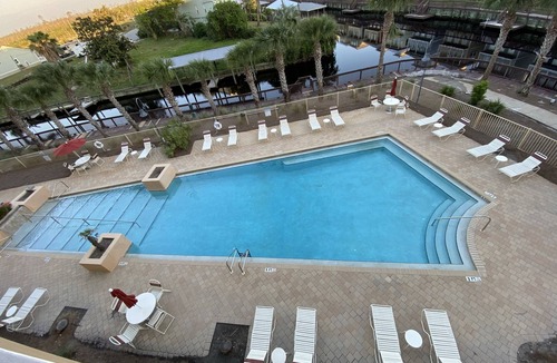 Waterside Village Condo | Cozy Coastal Condo – Walk to Beach, Dine, & Relax!