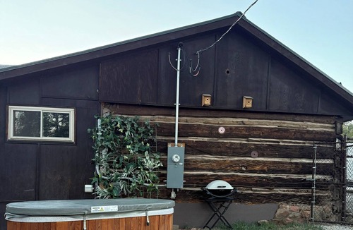 Pine Cabin | Cozy studio cabin in Pine with serene garden and conveniently close to highway.