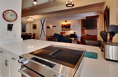 Frisco Condo | Creekside Condo in Downtown Frisco with Hot Tub, Pool & Mountain Views!