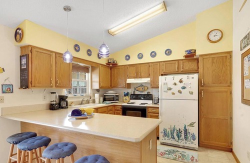 Butler Beach House | Decked Out: Cozy 3 bedroom beach house with Private Pool, screen porch and
