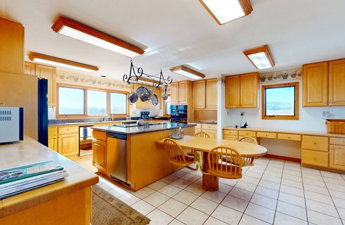 Glenwood Springs Cabin | Dog-friendly, mountain view lodge with a game room, fireplace, large deck, & W/D