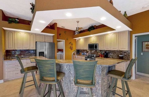 Matlacha Isles House | Dog-friendly waterfront home with heated pool, lanai, central AC, & W/D
