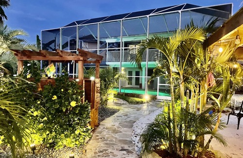Spring Hill House | Dolphin Point Retreat 50A RV Hookup 300' Waterfront Private Beach & Tiki Bar