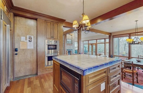 West End House | Elegant Aspen townhouse with an inviting deck, fireplace, and washer/dryer