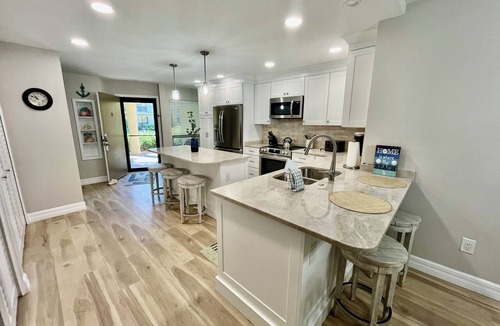 Butler Beach Condo | Enjoy FREE FUN Every Day during your stay in this spacious Gold-rated condo perfect for enjoying the beautiful Florida weather.