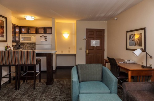 Rockrimmon Condo | Equipped Suite with Mountain View | Outdoor Pool Access, Housekeeping + Business Center