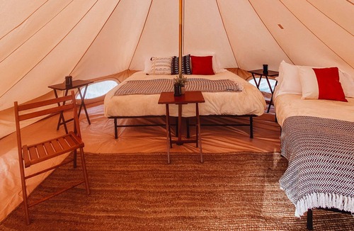 Tropic House | Family Tent w/Shared Bathroom - Beauty awaits you just past the red cliffs.