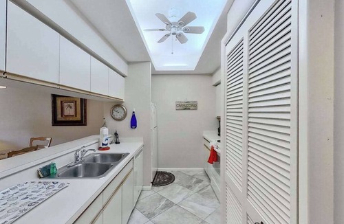 Bonita Bay Condo | Gated resort community condo with water views, pool, hot tub, & balcony