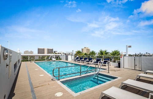 Bay Harbor Islands Apartment | Gateway 2BR, 2.5BA Apartment | Bay Harbor Islands Rooftop Pool & Family-Friend