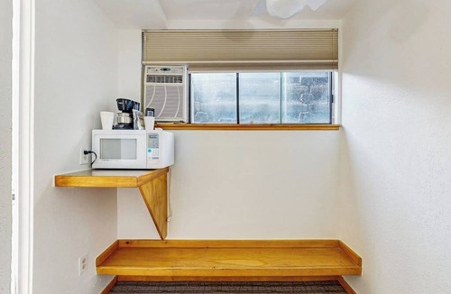 West End Cabin | Ground-floor room on Main St - pool & hot tub - walk to lifts, dog-friendly