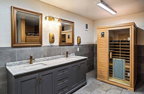 Taos Apartment | King Suite, kitchenette, private fenced patio with shared laundry and sauna on site.