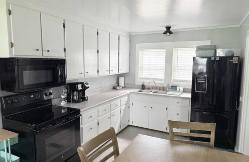 Thomas Drive House | Lakefront Home, Private Beach, Firepit, Kayaks, Pets, Floats, Spring Fed Lake